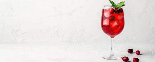 A sophisticated Cranberry Sangria in a sleek photo