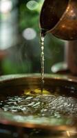 Closeup of a distillation process for essential oils. photo