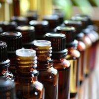 Closeup of a variety of essential oil bottles. photo