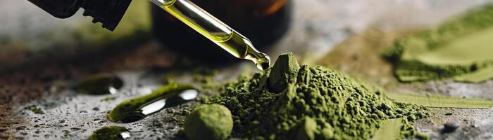 Closeup of matcha extract in a dropper bottle. photo