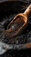 Closeup of coffee extract with coffee grounds. photo