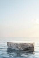 A white block podium stage is floating in the ocean photo