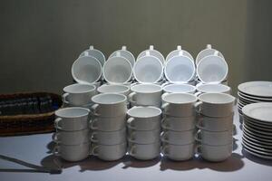 Ceramic tableware on a table in a restaurant, stock photo