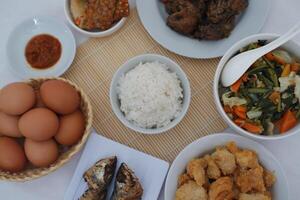 Traditional indonesian dinner appetizer table as a background photo