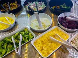 The variety of ingredients on the salad bar counter. photo