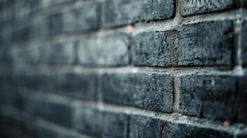 Black Painted Brick Wall With Subtle Texture and Lighting photo
