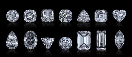 Dazzling diamond with reflection on black background photo