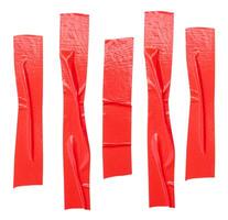 Top view set of wrinkled red adhesive vinyl tape or cloth tape in stripe shape isolated on white background with clipping path photo