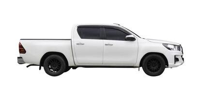 Side view of white pickup truck isolated on white background with clipping path photo