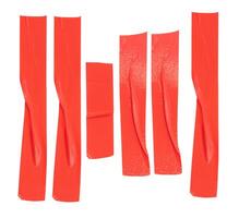Top view set of wrinkled red adhesive vinyl tape or cloth tape in stripe shape isolated on white background with clipping path photo