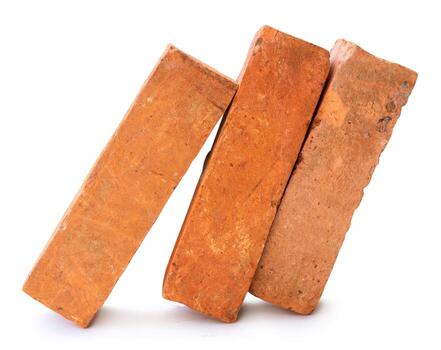 Side view of old orange or red bricks in stack isolated on white background with clipping path photo
