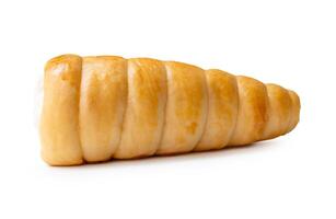 Side view of puff pastry cream horn isolated on white background with clipping path photo