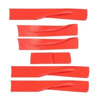 Top view set of wrinkled red adhesive vinyl tape or cloth tape in stripe shape isolated on white background with clipping path photo