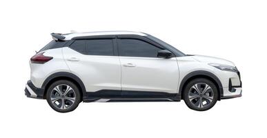 Side view of white hatchback car isolated on white background with clipping path photo