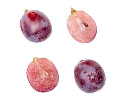 Top view set of two red grapes or purple grapes with halves isolated on white background with clipping path photo