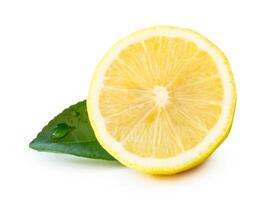 Front view of yellow lemon half with green leaf isolated on white background with clipping path photo