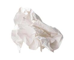 Front view of single white screwed or crumpled tissue paper ball isolated on white background with clipping path photo
