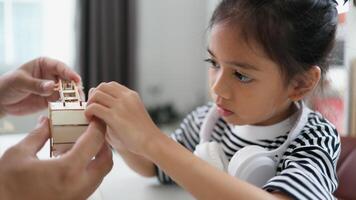 STEM education concept. Asian students learn at home with STEM toys, mathematics engineering science technology computer code in robotics for kids' concepts. photo