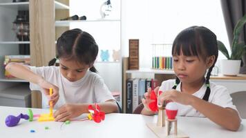 STEM education concept. Asian students learn at home with STEM toys, mathematics engineering science technology computer code in robotics for kids' concepts. photo