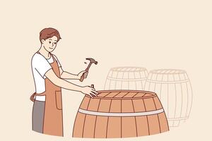 Man winemaker opens barrel with finished drink to taste bordeaux made from organic grapes vector