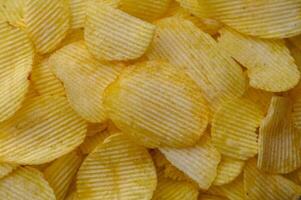 background from potato chips macro photo Top view. Flat lay 1