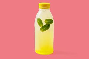 Melon lemonade with melon puree, mint, melon syrup, ice, sparkling water on a red background for food delivery website 1 photo