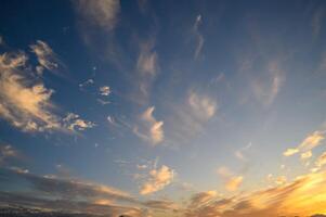 The gathering clouds during sunset create abstract painting patterns in the western sky. 1 photo