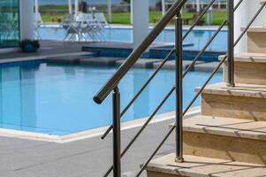 staircase near the pool in a residential complex 3 photo