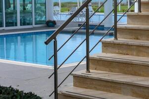 staircase near the pool in a residential complex 1 photo