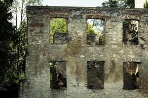 old building with a lot of windows and a lot of brick photo