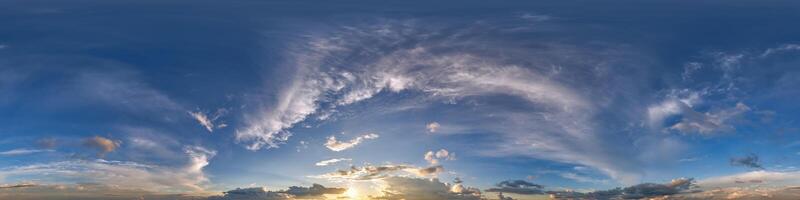 360 hdri sky before sunset with beautiful awesome clouds. Seamless panorama with zenith for use in 3d graphics or game development as sky dome or edit drone shot as sky replacement photo