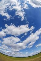 blue sky background with white striped clouds in heaven and infinity may use for skydome replacement photo
