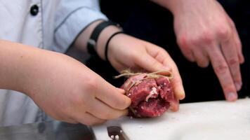 Fresh beef meat for cooking, cut with knife. Step by step process of cooking steak. Fresh juicy meat. Cut to measure temperature of product video