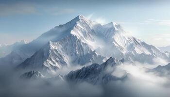 Snow-Capped Mountain Peaks Amidst Misty Clouds in Majestic Alpine Landscape photo
