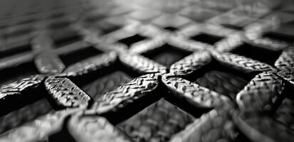 Close-Up View of Hexagonal Pattern With Water Drops on Dark Surface photo