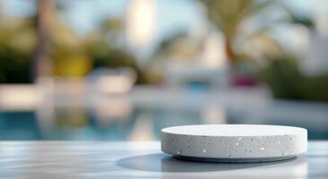 Concrete Object on Table Near Poolside in Bright Daylight photo