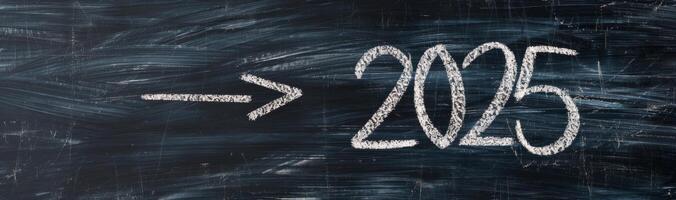 Chalkboard Arrow Pointing Toward Year 2025 photo