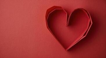 Red Origami Heart on Vibrant Background photo
