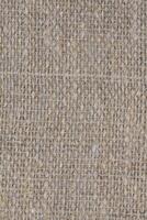 Macro canvas texture close up. Background canvas with a macro lens vertically photo