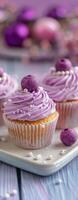 Lavender Cupcakes With Purple Toppings Made In A Modern Kitchen photo