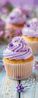 Lavender Cupcakes With Purple Toppings Made In A Modern Kitchen photo