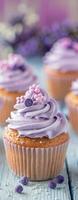Lavender Cupcakes With Purple Toppings Made In A Modern Kitchen photo