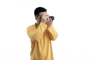 Successful professional photographer use DSLR digital camera iso. Professional male photographer with digital camera shooting photo
