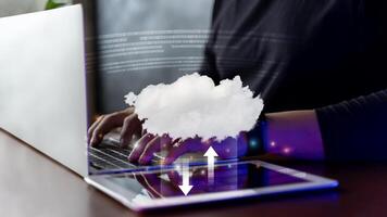 Computing resources and cloud technology concept storage. Businessman using laptop with cloud computer icon. photo