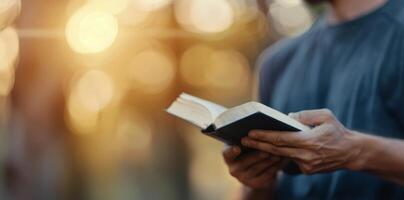 Man Reading Book Outdoors photo