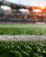 Football on Grass Field With Blurry Lights photo