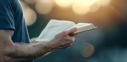 Man Reading Book Outdoors photo