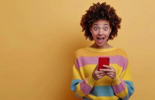 Excited Woman Looking At Phone photo