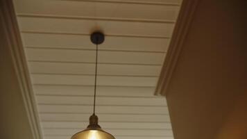 loft style lamps hanging on the ceiling, view from below video