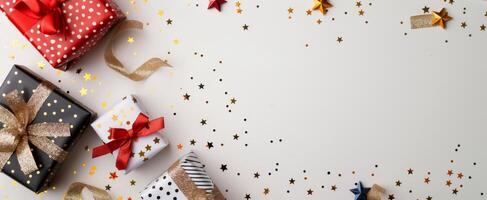 Wrapped Gifts With Gold Stars on White Background photo